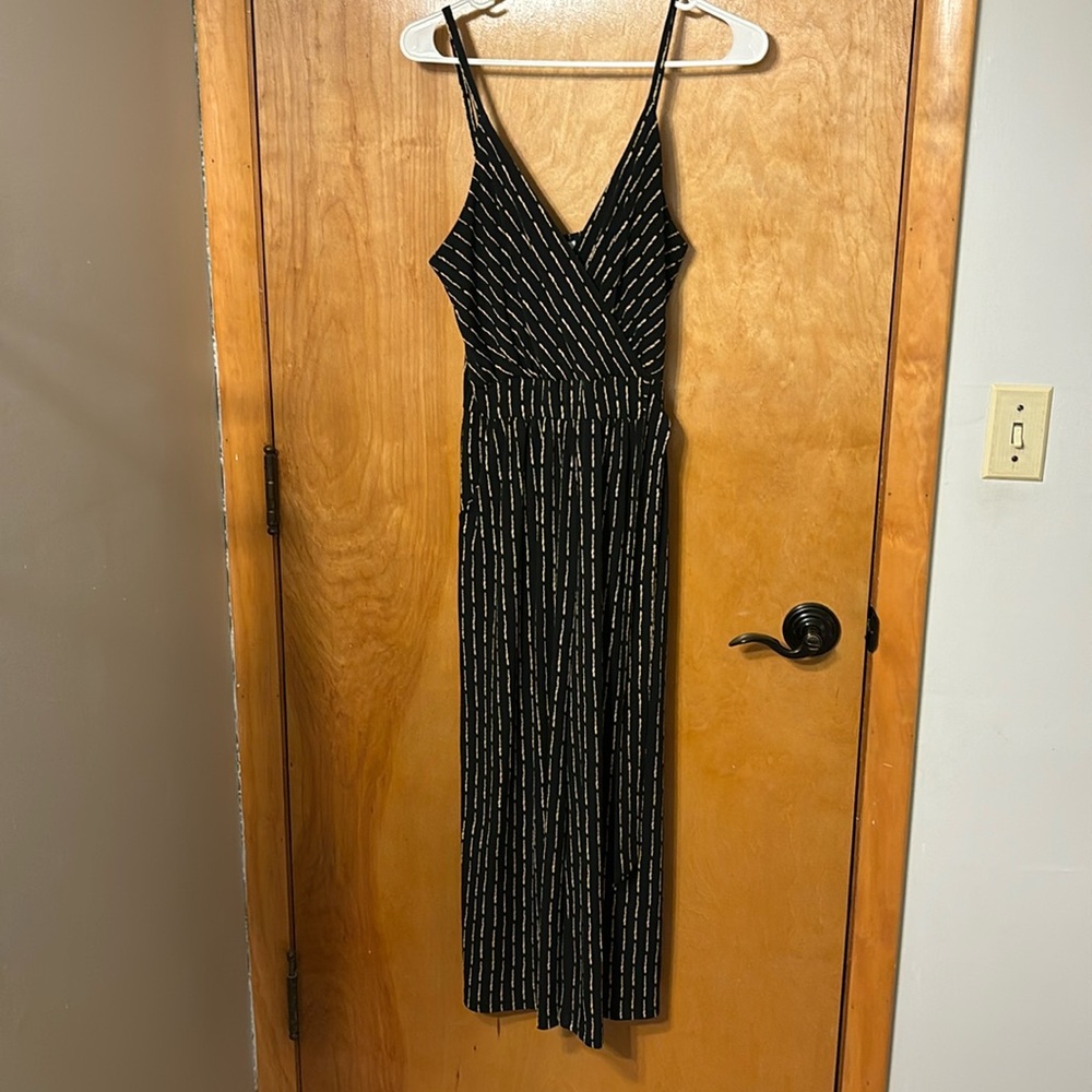 Black and cream jumpsuit with tie side. Kaileigh brand size small